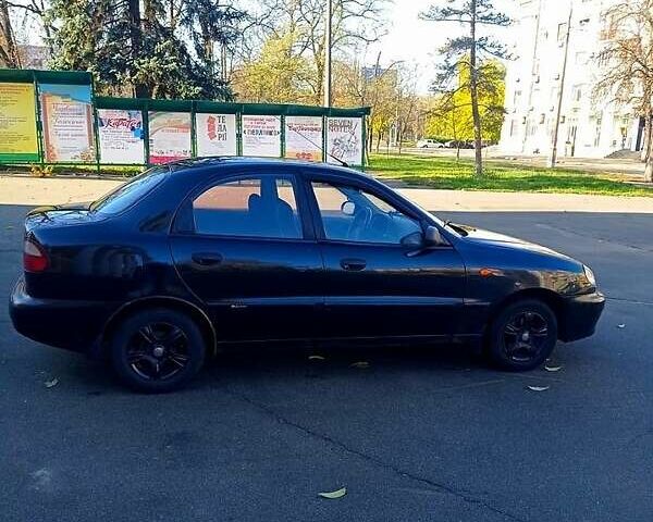 Черный Дэу Ланос, объемом двигателя 1.5 л и пробегом 365 тыс. км за 2000 $, фото 2 на Automoto.ua