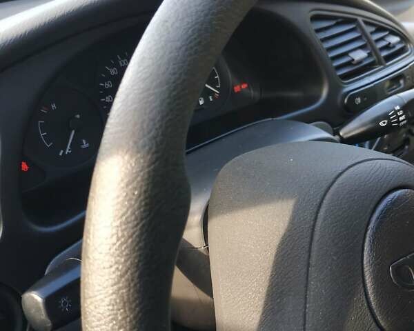 Чорний Деу Ланос, об'ємом двигуна 1.5 л та пробігом 37 тис. км за 3950 $, фото 22 на Automoto.ua
