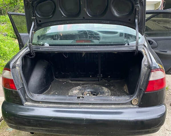 Черный Дэу Ланос, объемом двигателя 0 л и пробегом 250 тыс. км за 2000 $, фото 10 на Automoto.ua