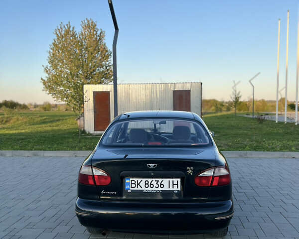 Чорний Деу Ланос, об'ємом двигуна 1.5 л та пробігом 162 тис. км за 2250 $, фото 1 на Automoto.ua