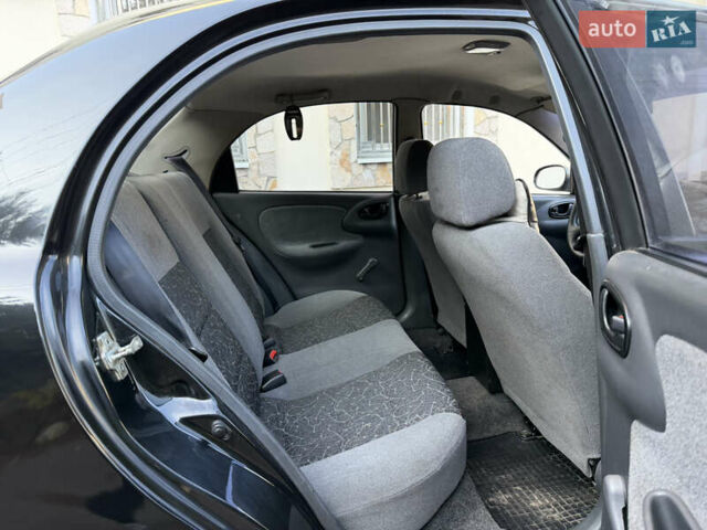 Черный Дэу Ланос, объемом двигателя 1.5 л и пробегом 100 тыс. км за 2900 $, фото 29 на Automoto.ua