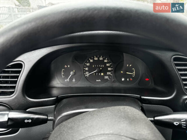 Чорний Деу Ланос, об'ємом двигуна 1.5 л та пробігом 220 тис. км за 2199 $, фото 15 на Automoto.ua