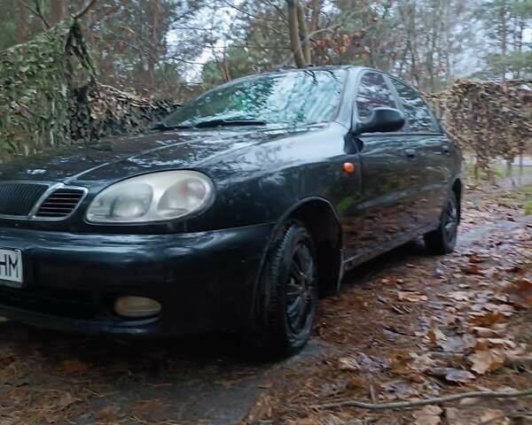 Чорний Деу Ланос, об'ємом двигуна 1.39 л та пробігом 170 тис. км за 2500 $, фото 2 на Automoto.ua