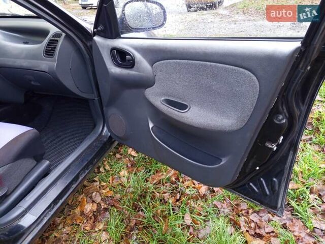 Черный Дэу Ланос, объемом двигателя 1.5 л и пробегом 180 тыс. км за 2300 $, фото 9 на Automoto.ua