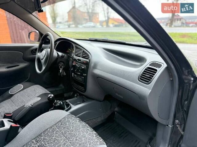 Черный Дэу Ланос, объемом двигателя 1.5 л и пробегом 225 тыс. км за 2999 $, фото 23 на Automoto.ua