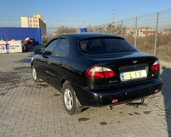 Черный Дэу Ланос, объемом двигателя 1.4 л и пробегом 177 тыс. км за 1750 $, фото 3 на Automoto.ua