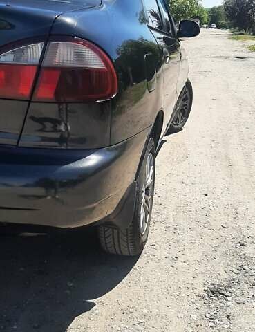 Деу Ланос 2008 у Запоріжжя на Automoto.ua Чорний Деу Ланос, об'ємом двигуна 1.5 л та пробігом 104 тис. км за 2700 $, фото 8 на Automoto.ua