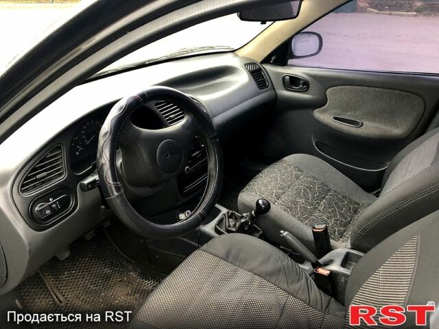 Чорний Деу Ланос, об'ємом двигуна 1.5 л та пробігом 198 тис. км за 1700 $, фото 6 на Automoto.ua