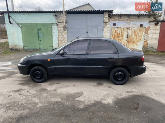 Чорний Деу Ланос, об'ємом двигуна 1.4 л та пробігом 180 тис. км за 1800 $, фото 11 на Automoto.ua