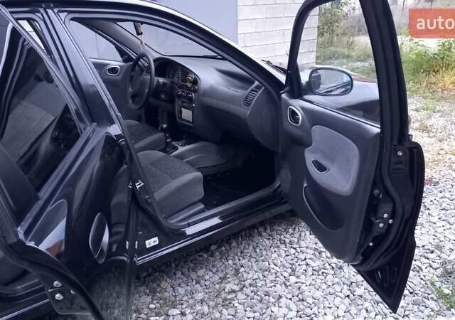 Черный Дэу Ланос, объемом двигателя 1.5 л и пробегом 159 тыс. км за 2850 $, фото 9 на Automoto.ua