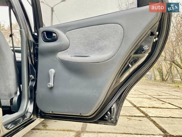 Чорний Деу Ланос, об'ємом двигуна 1.5 л та пробігом 198 тис. км за 2650 $, фото 25 на Automoto.ua