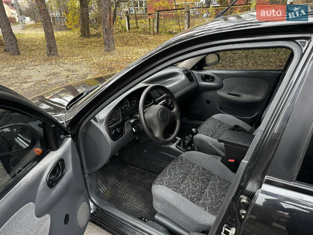 Чорний Деу Ланос, об'ємом двигуна 1.5 л та пробігом 220 тис. км за 2199 $, фото 9 на Automoto.ua