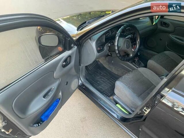 Чорний Деу Ланос, об'ємом двигуна 1.5 л та пробігом 245 тис. км за 3100 $, фото 7 на Automoto.ua
