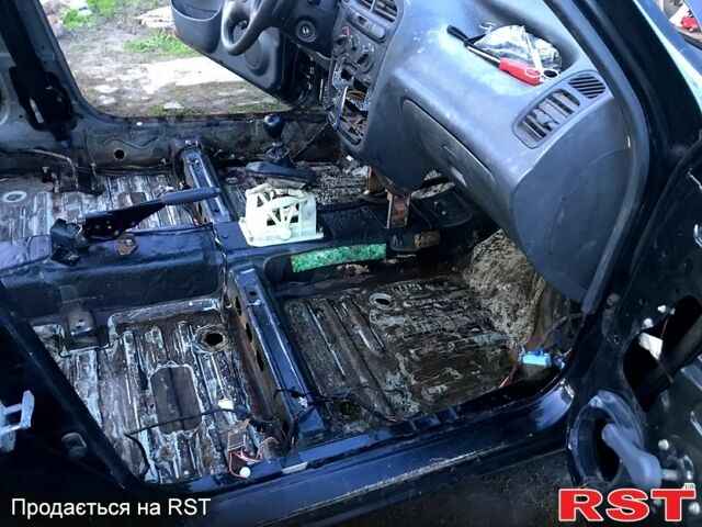 Черный Дэу Ланос, объемом двигателя 1.5 л и пробегом 368 тыс. км за 1150 $, фото 9 на Automoto.ua