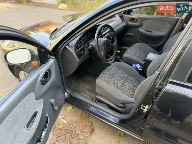 Черный Дэу Ланос, объемом двигателя 1.5 л и пробегом 100 тыс. км за 2900 $, фото 13 на Automoto.ua