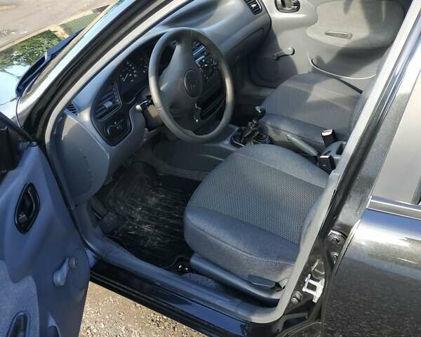Чорний Деу Ланос, об'ємом двигуна 1.5 л та пробігом 37 тис. км за 3950 $, фото 26 на Automoto.ua
