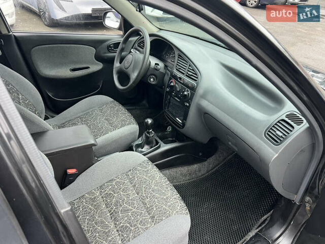 Чорний Деу Ланос, об'ємом двигуна 1.5 л та пробігом 220 тис. км за 2500 $, фото 9 на Automoto.ua