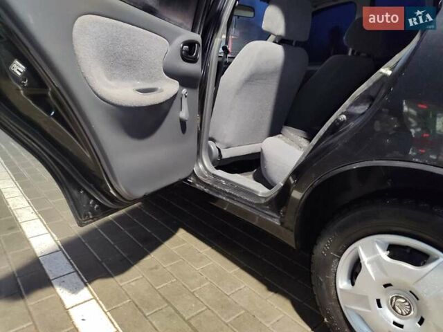 Чорний Деу Ланос, об'ємом двигуна 1.5 л та пробігом 147 тис. км за 2350 $, фото 13 на Automoto.ua