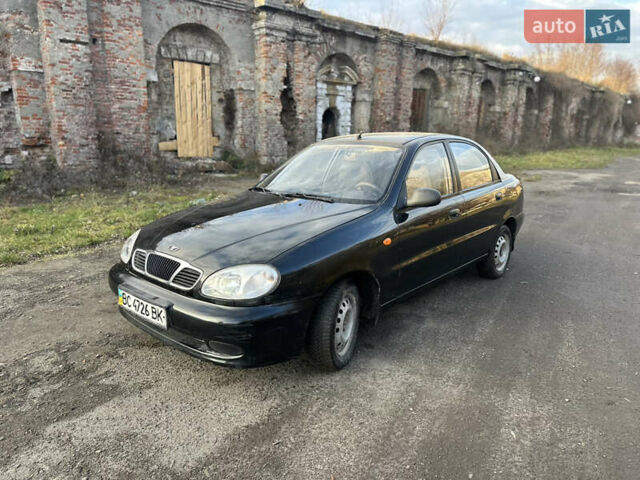 Черный Дэу Ланос, объемом двигателя 1.4 л и пробегом 220 тыс. км за 1450 $, фото 1 на Automoto.ua