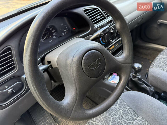 Черный Дэу Ланос, объемом двигателя 1.5 л и пробегом 100 тыс. км за 2900 $, фото 18 на Automoto.ua