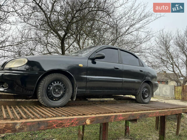 Черный Дэу Ланос, объемом двигателя 1.5 л и пробегом 219 тыс. км за 2300 $, фото 17 на Automoto.ua