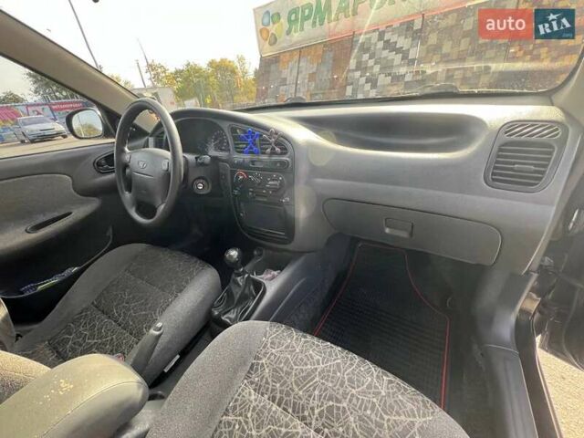 Черный Дэу Ланос, объемом двигателя 1.6 л и пробегом 137 тыс. км за 3600 $, фото 8 на Automoto.ua