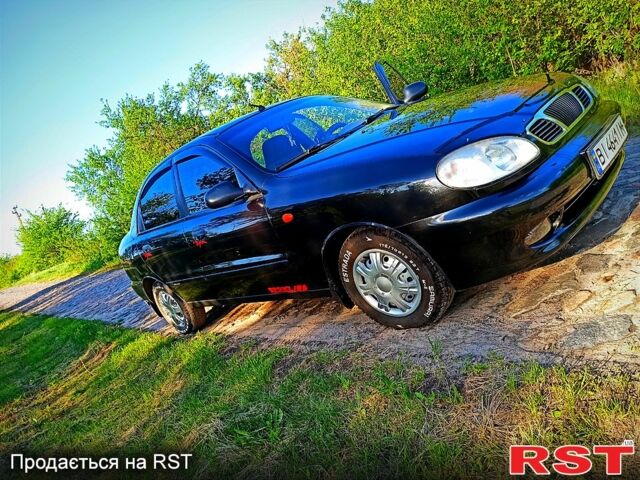 Черный Дэу Ланос, объемом двигателя 1.5 л и пробегом 195 тыс. км за 3500 $, фото 1 на Automoto.ua