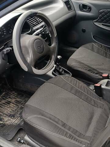 Чорний Деу Ланос, об'ємом двигуна 1.5 л та пробігом 190 тис. км за 2500 $, фото 4 на Automoto.ua