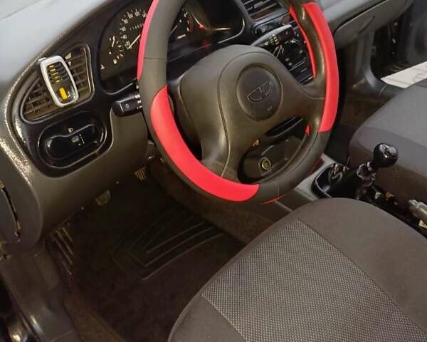 Чорний Деу Ланос, об'ємом двигуна 1.5 л та пробігом 114 тис. км за 2200 $, фото 6 на Automoto.ua