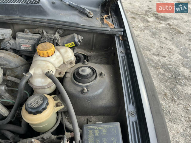 Черный Дэу Ланос, объемом двигателя 1.5 л и пробегом 219 тыс. км за 2300 $, фото 13 на Automoto.ua