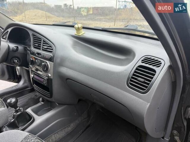 Черный Дэу Ланос, объемом двигателя 1.5 л и пробегом 128 тыс. км за 2999 $, фото 53 на Automoto.ua