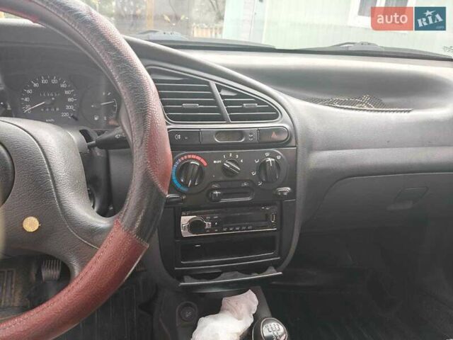 Чорний Деу Ланос, об'ємом двигуна 1.5 л та пробігом 117 тис. км за 2800 $, фото 2 на Automoto.ua