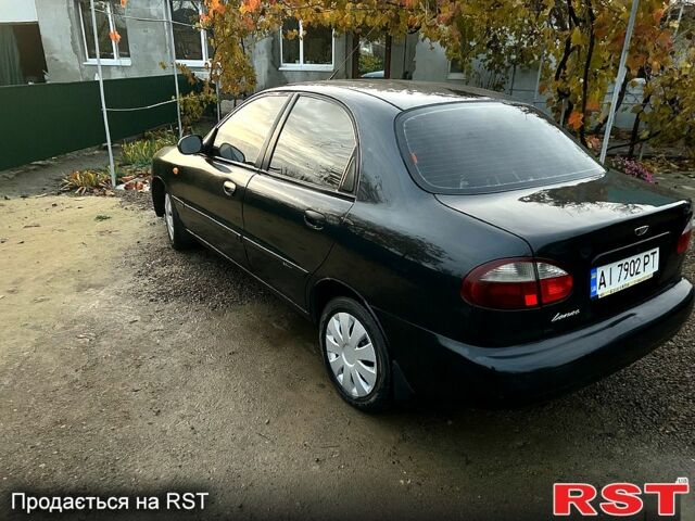 Черный Дэу Ланос, объемом двигателя 1.4 л и пробегом 220 тыс. км за 1800 $, фото 11 на Automoto.ua