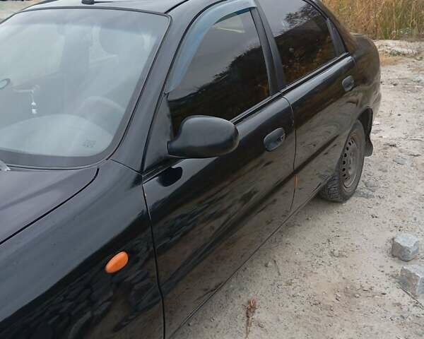 Черный Дэу Ланос, объемом двигателя 1.5 л и пробегом 250 тыс. км за 1700 $, фото 4 на Automoto.ua