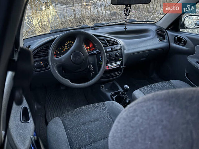 Черный Дэу Ланос, объемом двигателя 1.5 л и пробегом 313 тыс. км за 2400 $, фото 10 на Automoto.ua