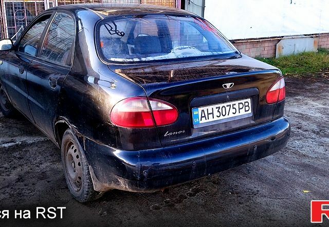 Черный Дэу Ланос, объемом двигателя 1.6 л и пробегом 269 тыс. км за 1300 $, фото 2 на Automoto.ua