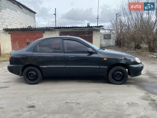 Чорний Деу Ланос, об'ємом двигуна 1.4 л та пробігом 180 тис. км за 1800 $, фото 1 на Automoto.ua