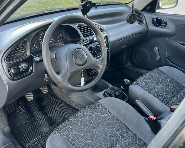 Чорний Деу Ланос, об'ємом двигуна 1.5 л та пробігом 162 тис. км за 2250 $, фото 5 на Automoto.ua