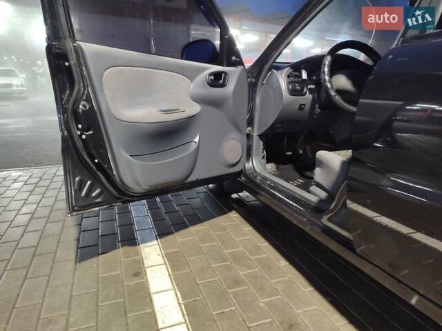 Чорний Деу Ланос, об'ємом двигуна 1.5 л та пробігом 147 тис. км за 2350 $, фото 12 на Automoto.ua