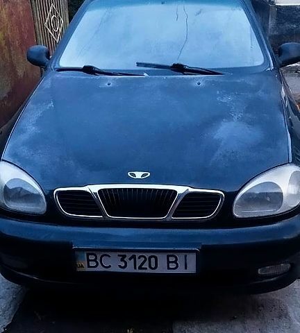 Черный Дэу Ланос, объемом двигателя 1.4 л и пробегом 300 тыс. км за 1500 $, фото 2 на Automoto.ua