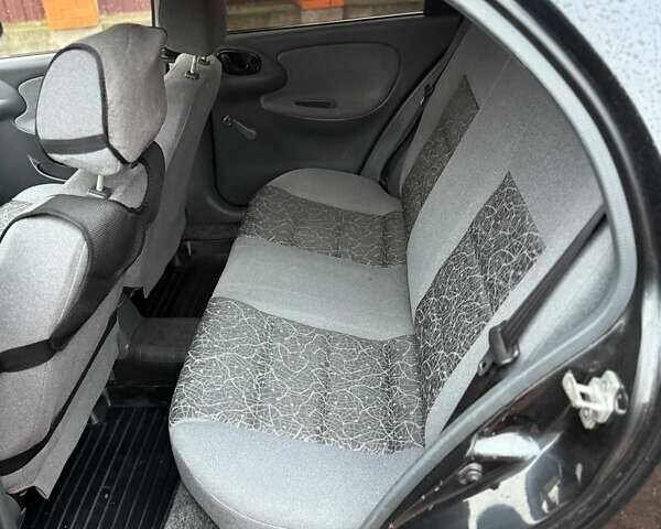 Черный Дэу Ланос, объемом двигателя 1.5 л и пробегом 225 тыс. км за 2999 $, фото 13 на Automoto.ua
