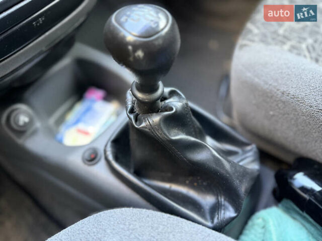 Черный Дэу Ланос, объемом двигателя 1.5 л и пробегом 100 тыс. км за 2900 $, фото 16 на Automoto.ua