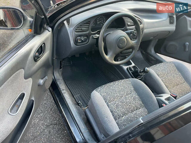 Чорний Деу Ланос, об'ємом двигуна 1.5 л та пробігом 100 тис. км за 3000 $, фото 13 на Automoto.ua
