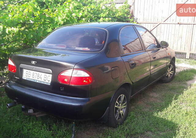 Черный Дэу Ланос, объемом двигателя 1.4 л и пробегом 175 тыс. км за 2500 $, фото 1 на Automoto.ua