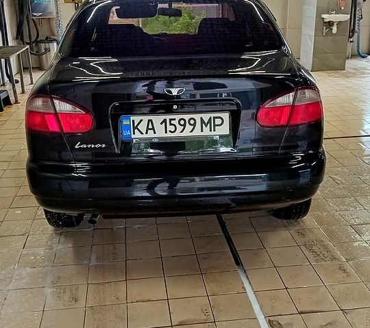 Черный Дэу Ланос, объемом двигателя 1.6 л и пробегом 198 тыс. км за 2900 $, фото 2 на Automoto.ua
