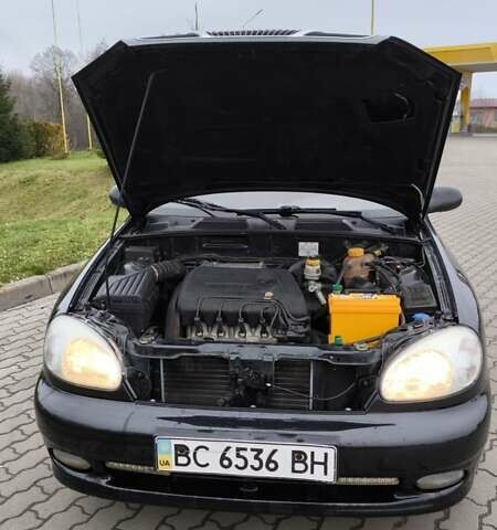 Черный Дэу Ланос, объемом двигателя 1.39 л и пробегом 213 тыс. км за 2300 $, фото 3 на Automoto.ua