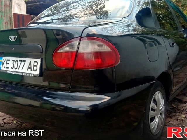 Черный Дэу Ланос, объемом двигателя 1.5 л и пробегом 276 тыс. км за 2000 $, фото 2 на Automoto.ua