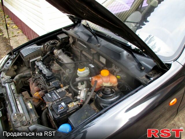 Черный Дэу Ланос, объемом двигателя 1.5 л и пробегом 230 тыс. км за 2000 $, фото 9 на Automoto.ua