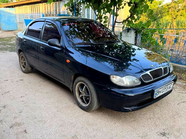 Черный Дэу Ланос, объемом двигателя 1.5 л и пробегом 192 тыс. км за 2700 $, фото 3 на Automoto.ua