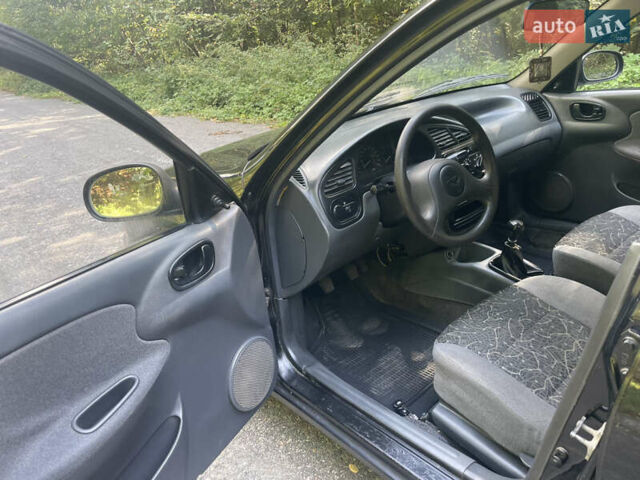 Чорний Деу Ланос, об'ємом двигуна 1.5 л та пробігом 157 тис. км за 2350 $, фото 15 на Automoto.ua
